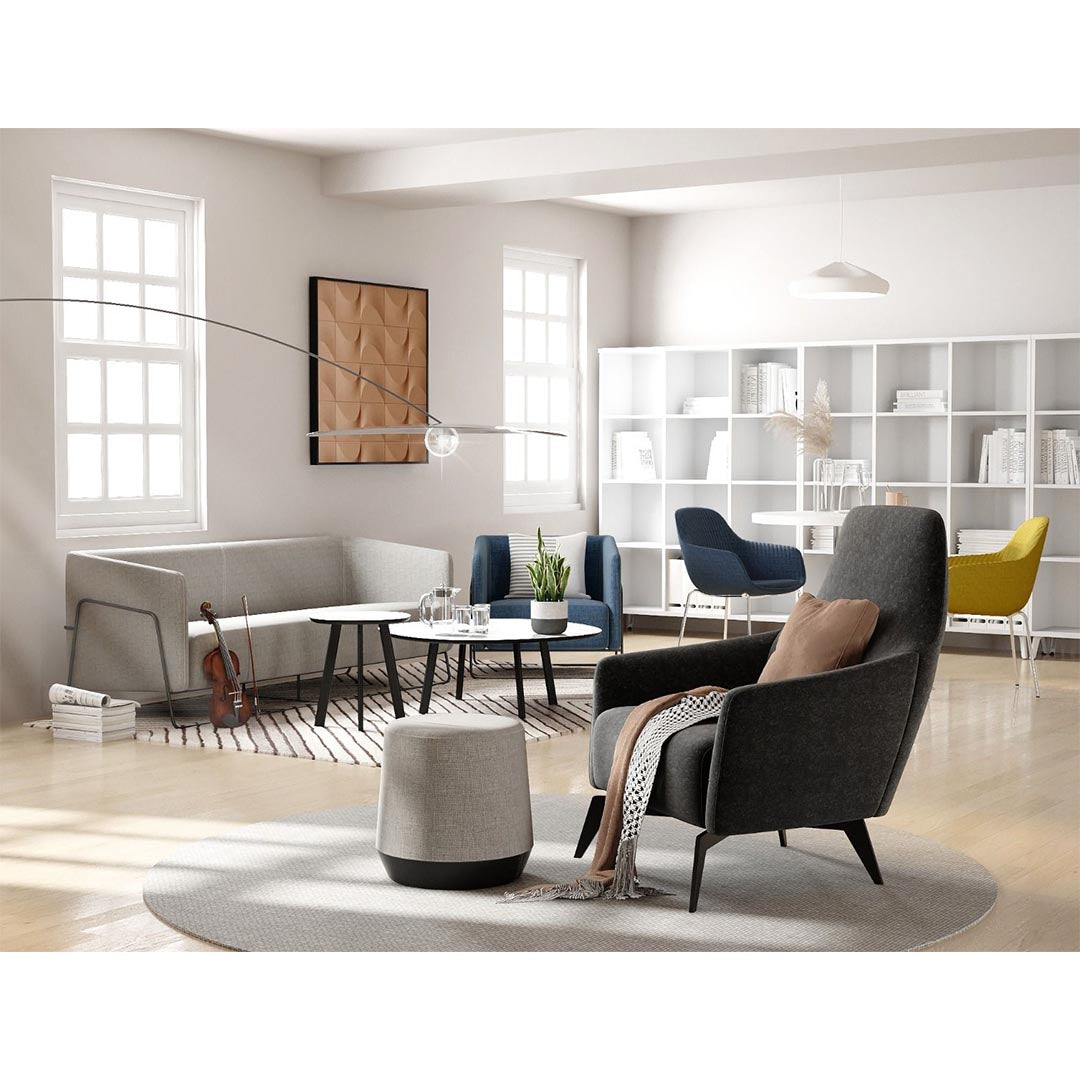 Styled shot of Anza Modern Armchair Lounge Seat by Friant - Color: Charcoal, Home Office, Kansas City Office Furniture, Workspace design, human centric design style, contemporary lobby