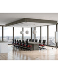 Calibrate Modern Conference Table in city view meeting room, surrounded by natural light. Boat-shaped top with knife edge. Enclosed power grommets. Kansas City Office Furniture.