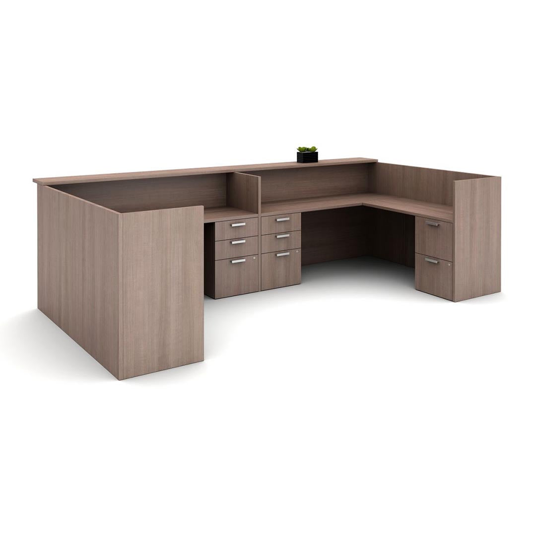 U desk cubicle. Aimtoo Savatre laminate. AIS Calibrate Reception desks. Corporate Office welcome desk, retail counter station. Dual storage pedestals with silver pulls. BBF and FF under desk drawers. Kansas City office furniture