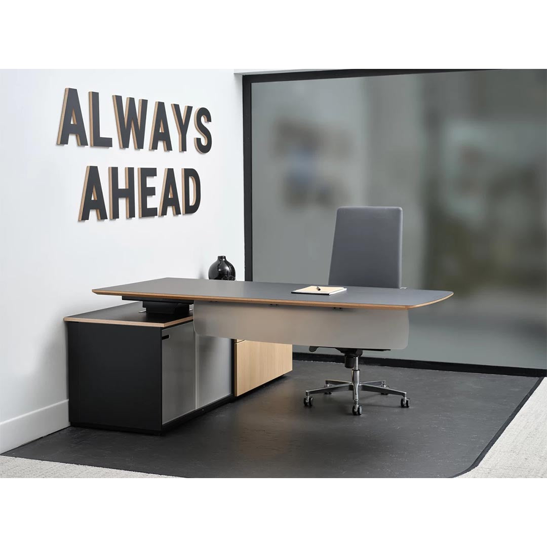 Enwork Cayman corporate office desk. Black and clear ash laminate. Height adjustable workstation positioned at sitting height with modesty panel. Executive desk with lower cabinets. Kansas City office furniture