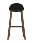 Back view of Allermuir Kin Low-Back Barstool with black seat and white oak Wood Legs, Kansas City office furniture