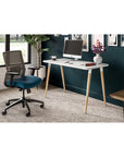 Reya Office Desk with Tapered Bamboo Legs in modern home office with natural light. Kansas City office furniture.