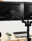 Black Clamp-On Dual Pneumatic Monitor Arm - Kansas City Office Furniture